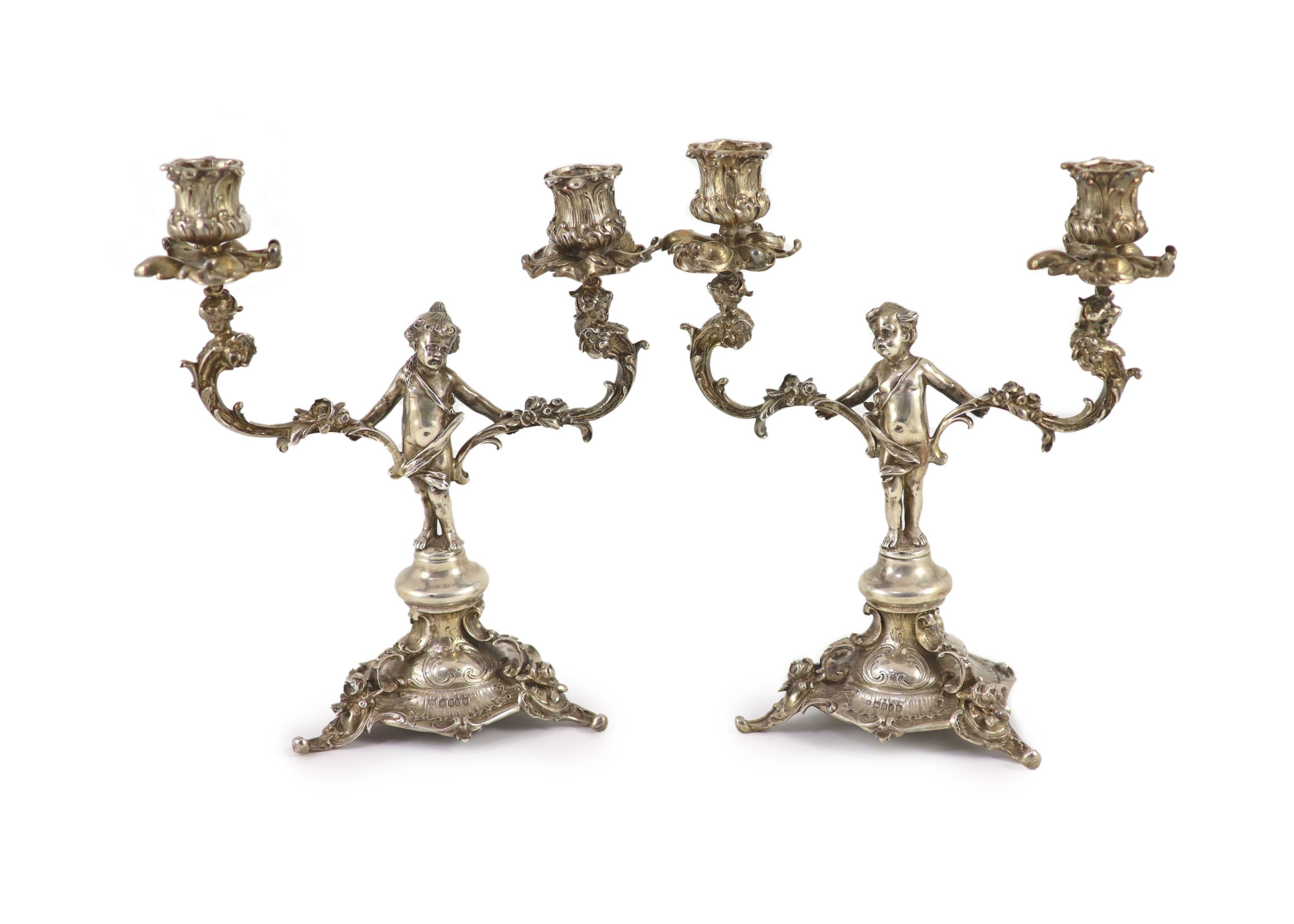 A pair of late Victorian silver two light, two branch candelabra